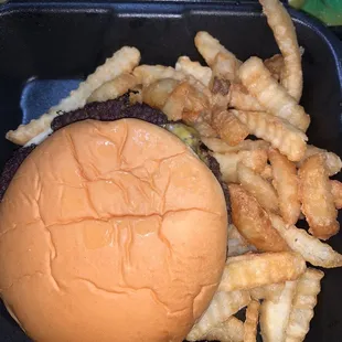 Half pound cheeseburger with fries