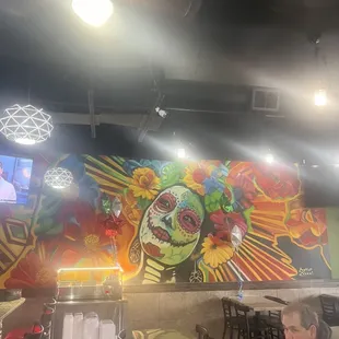 a man sitting at a table in a mexican restaurant