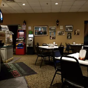 a restaurant with tables and chairs
