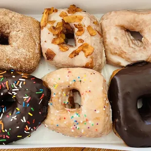 a variety of donuts in a box