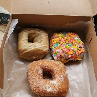 three different flavors of donuts