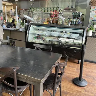 a table and chairs in a restaurant