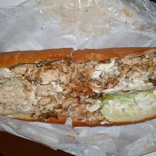 Chicken cheese steak, lettuce, provo, fried onions