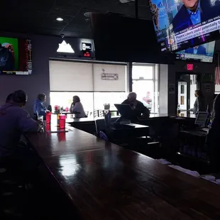 Bar, door &amp; wall of windows