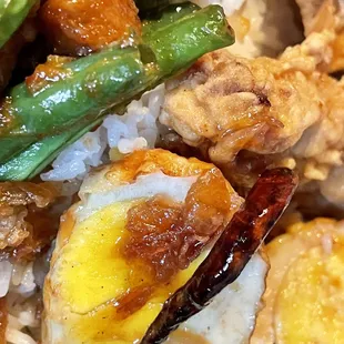 lunchbox--fried chicken, string beans, and eggs over rice. $10 + tax + tip