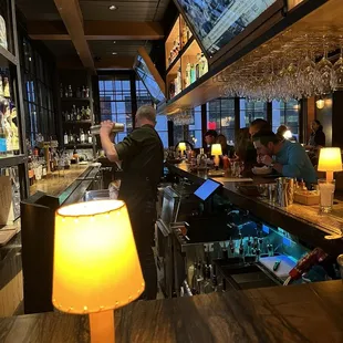 The bar. Hopping with mixed drinks on a Friday night.