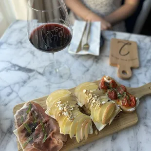 Blistered Tomato Crustie, Goat Cheese & Prosciutto Crustie, and Brie & Apple Crustie