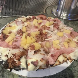 Hawaii&apos;s pizza adding bacon and onions