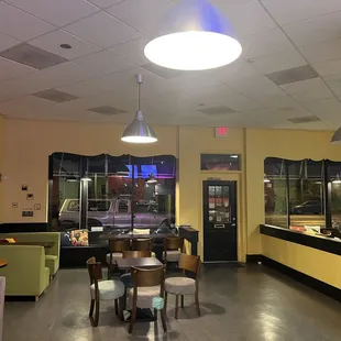 Inviting, large dining room. Lots of seating and nooks to play games or study.