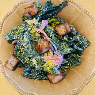 lacinato kale salad, feta preserved lemon dressing, roasted olive croutons, pickled red onion, cured egg yolk