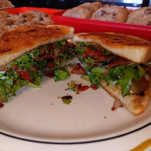 Our BEAUTIFUL BLT 
Made with 6 pieces of bacon, lettuce and tomato of course, spread evenly throughout every bite! 
mayo or garlic aioli!