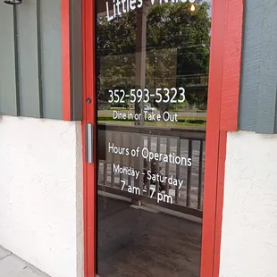 One of Our Front Doors
Number, and hours shown here as well