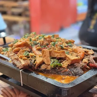 Grilled fish with snail rice noodle