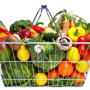 a shopping basket full of vegetables