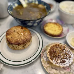 Beef curry, cheddar chive biscuit, egg tart, pecan tart.