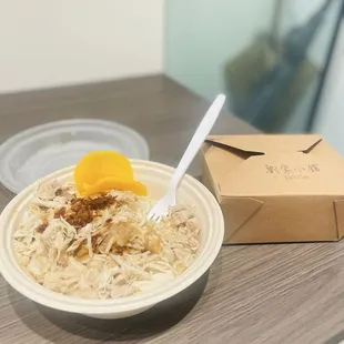 Chicken and rice and of course have to represent the cafe with their name stamped on the box