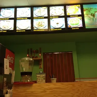 a restaurant counter and menus