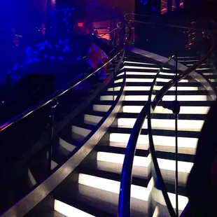 a staircase leading up to a stage