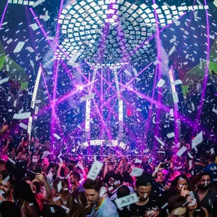 a large crowd of people at a party