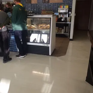 You cannot quite see the three tiers of flavored syrups behind the bakery case....it was impressive.