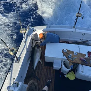 The first mate working away after we caught the first two fish.