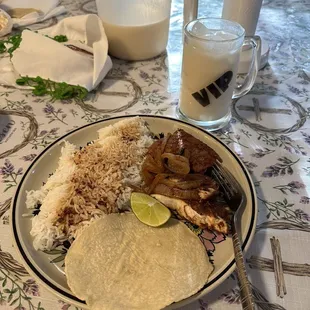 Mahi mahi marinated in authentic Mexican chiles, fresh tortillas, arroz, y horchata.