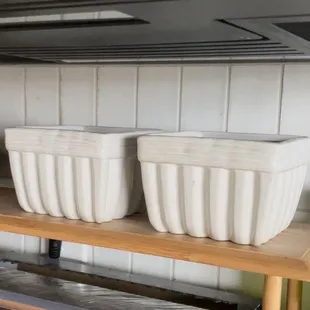 Two fruit storage dishes