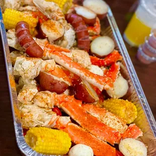 crab legs, corn, potatoes, corn on the cob, corn on the cob,