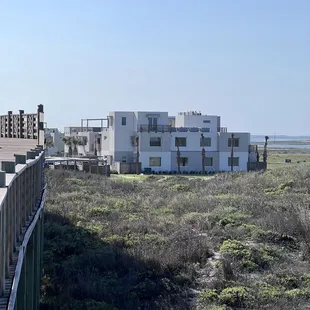 From the beach boardwalk looking at the Lively Beach property