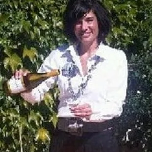 Jill bartending at a private backyard engagement party.