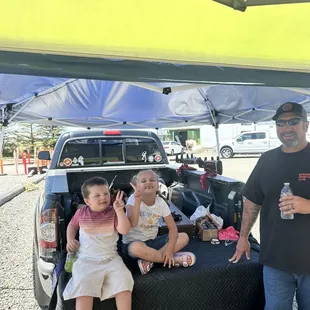 Back parking lot where we like to set up like it&apos;s a day camp. During hot days and family cheer section , having lots of space is great.