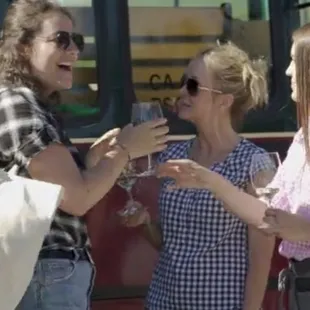 Greeted with glass of sparkling as soon as she exited the Trolley