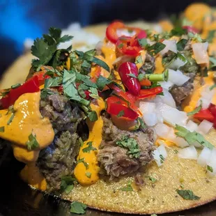 Green chile lamb on a soft cornbread base
