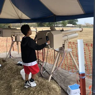 Shot apples at pumpkins