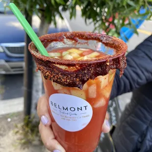 Michelagua - This is pineapple water with fresh fruit chunks and a sweet tangy rim.