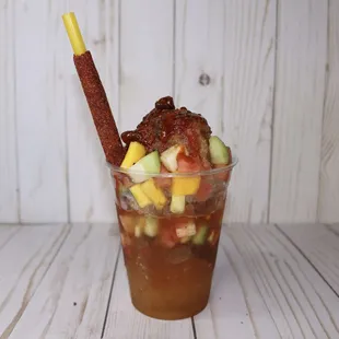 Brujita (shaved ice with fresh fruit, chamoy, tajin and Valentina)
Brujita (raspado con fruta fresca, chamoy, tajin y valentina)