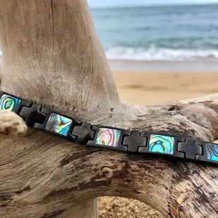 Flexible link bracelet inlaid with abalone shell. www.livingalohacreations.com