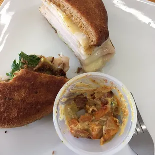 a plate with a sandwich and a bowl of soup