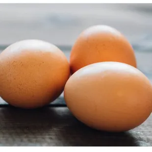 three eggs on a table