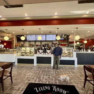 a man standing in a coffee shop