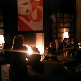 people sitting around a fire