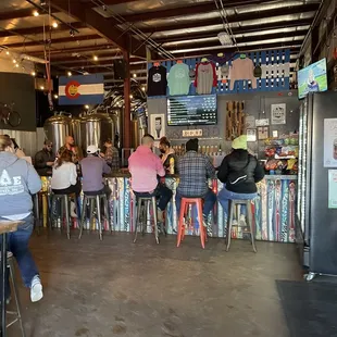 people sitting at the bar