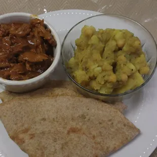 A very unique flat bread plus curry garbanzo and potatoes and a meat substitute of your choice