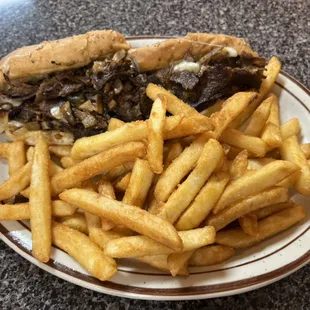 Philly cheesesteak and fries