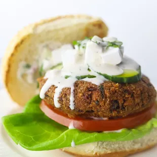 Greek Burger: lettuce, tomato, tzatziki, sliced cucumber, vegan &apos;feta&apos;