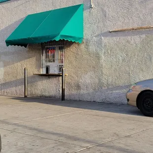 a car parked in front of a building