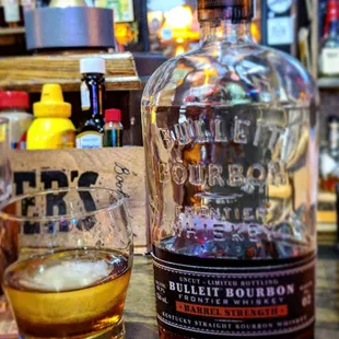 a bottle and a glass