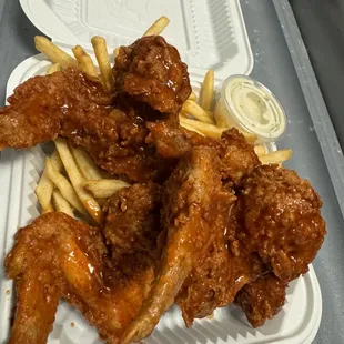 Lizetta&apos;s wings made with their house sauce