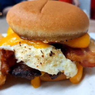 Double breakfast burger with cheddar. Check out that cheese melt! Yum.