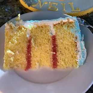 Lemon cake with raspberry filling and buttercream frosting